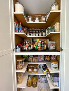 an organized pantry with lots of food and condiments