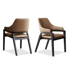 two brown chairs sitting next to each other