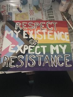 a sign that says respect my experience or expect my resistance on the front of a table