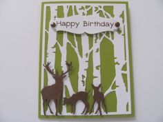 a happy birthday card with two deer in the woods