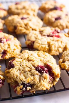 freshly baked oatmeal cranberry cookies cooling on a wire rack, ready to be eaten