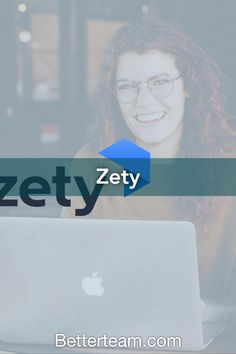 a woman sitting in front of a laptop computer with the words zety on it