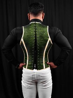 This Brocade Mens corset vests – a timeless piece designed to shape and tone your waist for a notable and Bold look.  This men's corset offers firm support to your body, while also improving your posture during daily activities.  It's crafted by hand with strong steel bones to give you a great fit. Each corset is made one by one to meet our high-quality standards.  Wearing this cool male corset vest makes you confident and give you unique appearance. You can wear it with different outfits, and it will make you stand out. It's not just your regular vest; it's a Bold way to show off your good taste and confidence.     Mens corset vests Features:      Style: Regular Length, Corset Vest  Corset Vest Features: Cord Lacing, Steel Busk  Color: Green, Beige  Achievable Waist Reduction: 3-4" Corset Vests Mens, Corset Vest Men, Mens Corset, Male Corset, Wing Cosplay, Vest Corset, Oc Board, Corset Vest, Corset Outfit