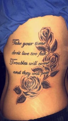 a woman's stomach with roses on it and the words take your time don't