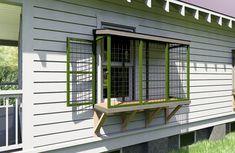 a white house with green shutters on the front and side windows that are open