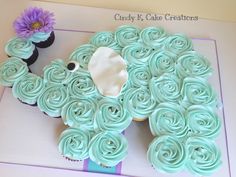 cupcakes with frosting in the shape of a sheep