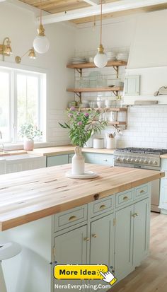 A bright and inviting kitchen design that features wooden countertops and white cabinetry. The large island provides ample workspace and seating, while open shelving adds a practical and decorative element. Pendant lights and natural light from the windows enhance the warm, welcoming atmosphere. Small Kitchen Renovation Ideas, Small Kitchen Renovation, Country Kitchen Ideas, Country Vibes, Green Kitchen Cabinets, French Country Kitchen, Kitchen Design Ideas, Cottage Kitchen