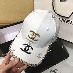 SHOP MORE LUXURY PRODUCTS HERE Description Chanel Cap White Chanel branded Cap with a dynamic and youthful design WhiteWhite FabricCC Logo Includes box, dust bag.This product is of the premium quality. Luxury White Snapback Hat, Designer White Visor Baseball Cap, Designer White Snapback Hat, Luxury White Baseball Cap, Designer White Visor Hat, White Baseball Cap With Logo Print, White Baseball Cap With Logo Print And Curved Visor, White Baseball Cap With Logo And Curved Visor, Luxury White Visor Hat