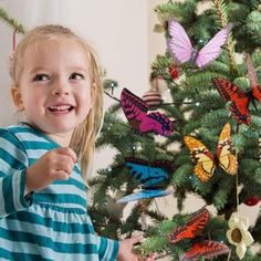 Merry Un-Christmas: 24 of the Best Year-Round Tree Decoration Ideas Paper Mache Eggs, Seasonal Decorations, Halloween Trees, Butterfly Decorations