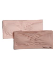 PRICES MAY VARY. Calvin Klein stocks her drawer with this 2 pack strapless bandeau Set includes 2 Bras Calvin Klein logo at band. Seamless style for all day comfort Assorted Colors Calvin Klein Girls, Strapless Bandeau, Calvin Klein Woman, 2 Pack, Calvin Klein, Lingerie, Bra, Band, Clothes For Women