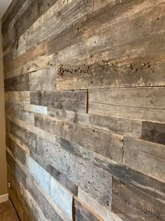 a wood paneled wall in a room