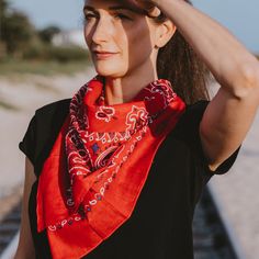 This is a best-seller and sure to become your favorite accessory! The oversized scarf is a 30"x30" square made of premium cotton and a true red color with blue and white detailing. Wear it around your neck, tied in your hair, over your head - there are so many options! Red Bandana Print Scarf As Gift, Adjustable Red Bandana For Summer, Elegant Red Scarf Bandana, Bandana Neck Scarf, Casual One-size Bandana Print Headscarf, Cheap Multicolor One-size Bandana, Red Bandana, Oversized Scarf, True Red