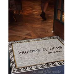 the entrance mat for stavros and sons since 1876 is shown in front of a doorway