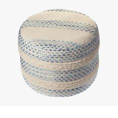 a blue and white round poufce on a white background