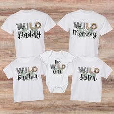 Celebrate your little one's adventurous spirit with our Wild One birthday shirt, perfect for a wild and fun-filled celebration! Coordinate with the whole family with our matching shirts, creating a stylish and cohesive look for your safari-themed party. Whether you're exploring the jungle or roaming the zoo, these family wild shirts are sure to add an extra dose of excitement to your little one's special day. Check out the black version at:  https://bcltycreations.etsy.com/listing/1696515520 Shi Safari Birthday Shirt, Wild One Birthday Shirt, Wild Theme, 8 Birthday, Safari Theme Birthday, Wild One Birthday, Safari Theme Party, First Birthday Shirts, Safari Birthday