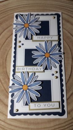 a card with two blue flowers on it