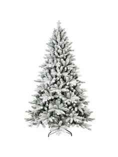 a white christmas tree with snow on it