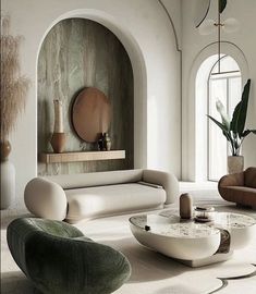 a living room filled with lots of furniture next to a wall covered in plants and potted plants