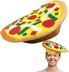 a woman with a pizza hat on her head