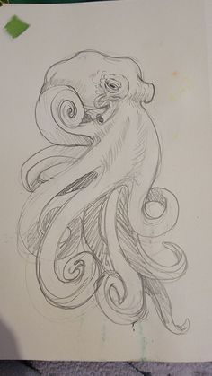 a drawing of an octopus on paper