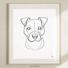 a line drawing of a dog's face in black and white on a wall