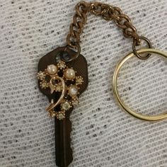 two key chains that have been placed next to each other