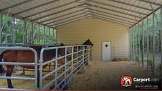 two cows are standing in their stalls at the farm