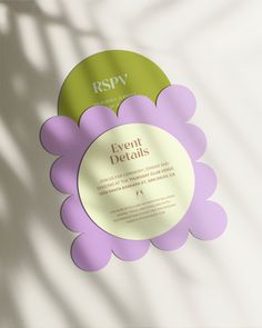 an event details brochure is displayed on a white background with shadow from the sun