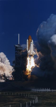 an image of a space shuttle taking off