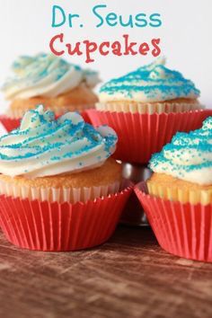 some cupcakes with blue and white frosting on them