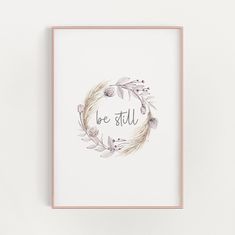 an art print with the words be still in a circle surrounded by flowers and leaves