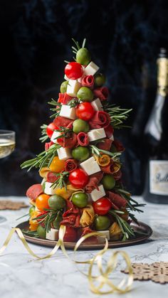 a christmas tree made out of different types of food