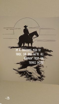 a drawing of a man riding a horse on the side of a wall with an inspirational quote