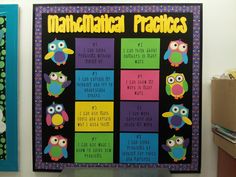 colorful bulletin board with owls and words on it