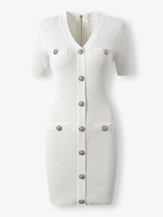 a white dress with buttons on the front