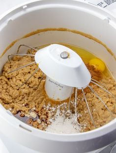 a food processor filled with batter and eggs