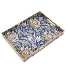 an ornate blue and yellow tray with flowers on the bottom, sitting in front of a white background