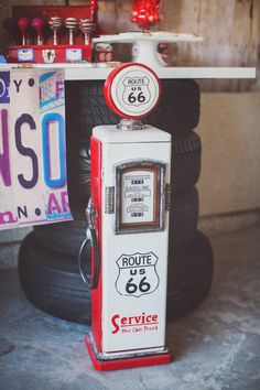 an old fashioned gas pump sitting on the ground