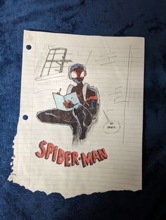 a drawing of a spider man sitting on top of a piece of paper with writing underneath it