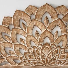 an intricately carved wooden wall decoration