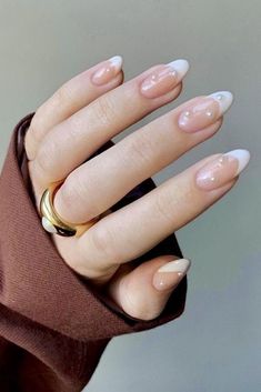 - French nail with white pearls - Quantity: 10pc acrylic press on in the box  - 10 shapes to choose: Short almond, Long almond, Short oval, Long oval, Short coffin, Long coffin, Short stiletto, Long stiletto, Short square, long square * In the photos we used short almond - A free nail glue is offered per each client - Size: XS, S, M, L  Please read our inner arch measurement chart carefully  - Handling time 3-5 days since they are all handmade :)  * How to order * 1. Choose nail shape 2. Choose size How to use: 1. File the sides of the press-on nail to fit your nail beds 2. Apply one nail at a time, cover your whole nail with glue, then align the press-on with your nail bed and press down firmly for 20 seconds. Use UV/ LED lamp  3. Enjoy your nail for up to two weeks How to measure what is Gel Set, Pearl Nails, Almond Nail, Round Nails, Bridal Nails, Luxury Nails, Prom Nails, Minimalist Nails, Dream Nails