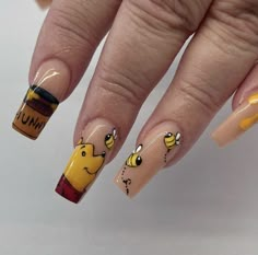 Planning a trip to a Disney park? Try these Disney nail designs, featuring your favorite characters from Mickey Mouse to Ariel and Baby Yoda. #disney #nails #disneyland Cars Nails Disney, Baby Yoda Nails, Sns Nail Art, Disney Land Florida, Pixar Nails, Winnie The Pooh Nails, Pooh Nails, Disney World Nails, Yellow Acrylic Nails