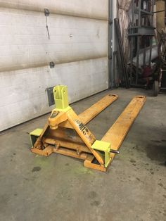 two yellow jacks sitting on top of each other in front of a garage door