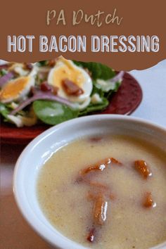 a bowl of hot bacon dressing next to a plate of salad