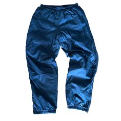 Vintage 90s Blue Nike Parachute Pants / Streetwear / Rare / TikTok Style / L Tagged Size: L Fits Like: TTS Measurements (waist x rise x inseam) : 15 in x 16 x 32.5 in Please examine all photos as vintage clothing is subject to wear! 90s High Waist Blue Pants, 90s Style High Waist Blue Pants, 90s Style Blue Bottoms With Relaxed Fit, 90s Style Blue Nylon Bottoms, Relaxed Fit Blue Bottoms For Outdoor, Blue Relaxed Fit Bottoms For Outdoor, 90s Style Blue Bottoms With Pockets, 90s Blue Bottoms With Pockets, Blue Relaxed Fit Nylon Pants