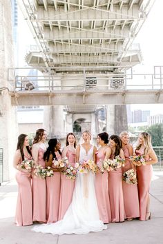 Classic Spring Bridal Style with Bridesmaids in Soft Blush Pink Matching Satin Dresses Pastel Pink Bridesmaids Dresses, Peachy Pink Bridesmaid Dresses, Neutral And Pink Wedding, Pink Bridesmaid Dresses Matching, Bridesmaids With Colorful Bouquets, Satin Blush Bridesmaid Dresses, Blush Bridal Party, Peony Pink Bridesmaid Dresses, Pastel Pink Bridesmaid