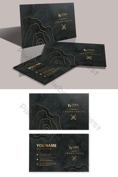 an elegant black business card with gold foil on the front and back, in two different colors