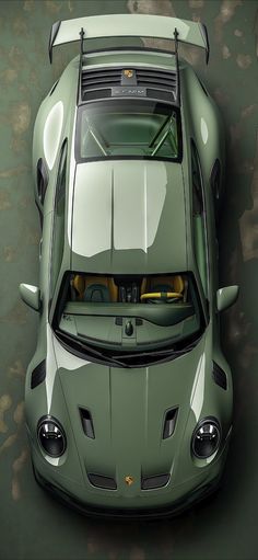 an overhead view of a green sports car