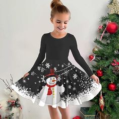 Season:Winter,Fall; Fabric:Polyester; Sleeve Length:Long Sleeve; Dress Length:Above Knee; Look After Me:Machine wash; Gender:Girls'; Style:Casual,Cute,Beautiful; Elasticity:Micro-elastic; Occasion:Sports  Outdoor,Vacation,Holiday,Daily; Kids Apparel:Snowflake Dress,Dress,Christmas Dress; Age Group:Kids; Fit Type:Regular Fit; Dresses Type:A Line Dress,Casual Dress; Pattern:Snowflake,Santa Claus,Snowman; Design:Print; Age:3-12 Years; Listing Date:10/18/2023; Bust:; Length:; Neck:; Sleeve:; Waist:; 3d Santa Claus, Kids Christmas Dress, Snowflake Dress, Simple Homecoming Dresses, Snowman Snowflake, Womens Basic Tops, Snowman Design, Kids Christmas Outfits, Outdoor Vacation