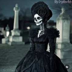 a woman in a skeleton costume is standing outside at night with her head turned to the side